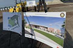 two poster boards of Rye Ranch Elementary School renderings are shown at the ground breaking event in Parrish Florida