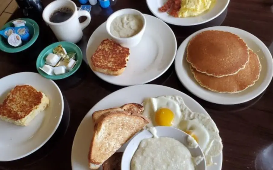 a delightful breakfast spread including pancakes, eggs, and bacon at Butterfields Family Restaurant, a hidden gem in Parrish Florida